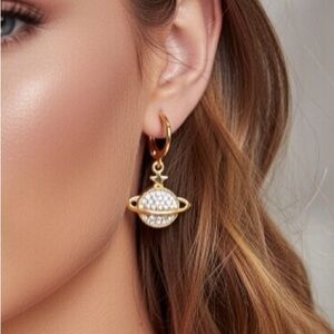 Saturn gold dangle earrings